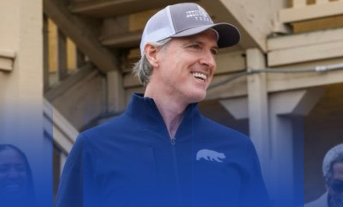 Photo of California Governor Gavin Newsom wearing a basecall cap.